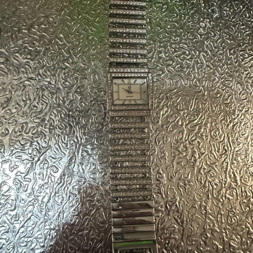 Women’s used silver diamond watch